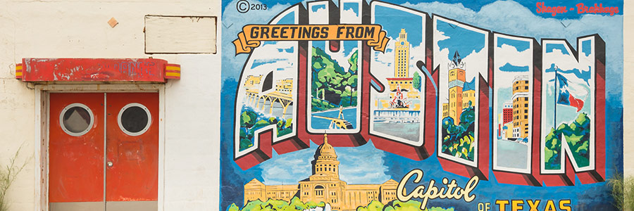 greetings from austin mural on building